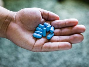 It's getting increasingly difficult for patients to afford Truvada, also known as pre-exposure prophylaxis, or PrEP, because of the drug's high price and insurance company efforts to restrict the use of coupons that shield patients from it. (Heidi de Marco/KHN/TNS)