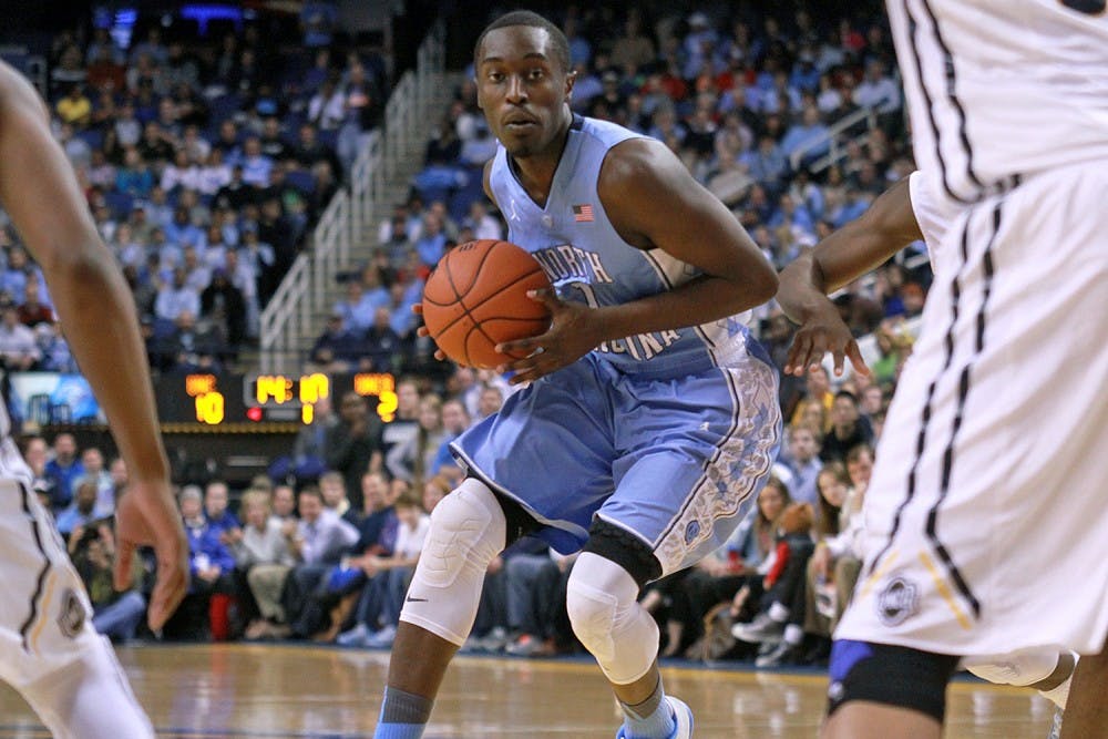 Freshman Theo Pinson (1) is out indefinitely with a broken bone in his left foot.