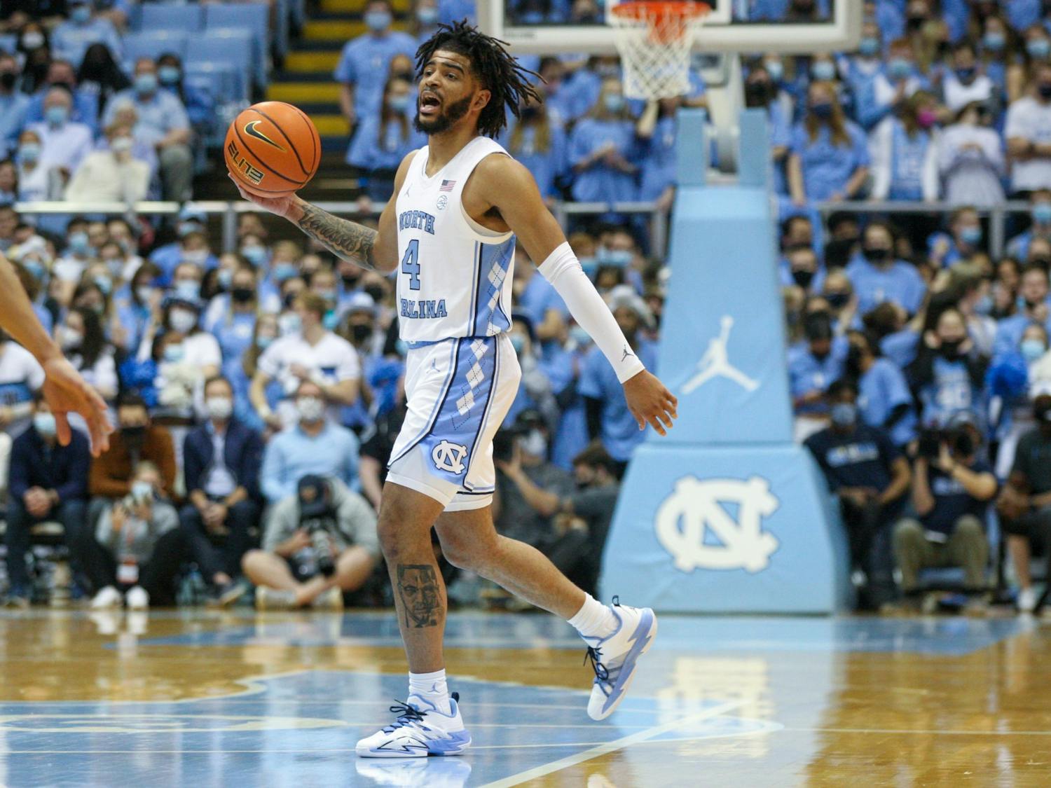 Sophomore guard RJ Davis (4) dribbles the ball at the game against Pittsburgh on Feb. 16, 2022 at the Smith Center. UNC lost 76-67.
