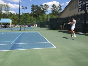 First-year Benjamin Siguoin competes in the ACC Championship semifinals against Florida State on April 28 at Cary Tennis Park.