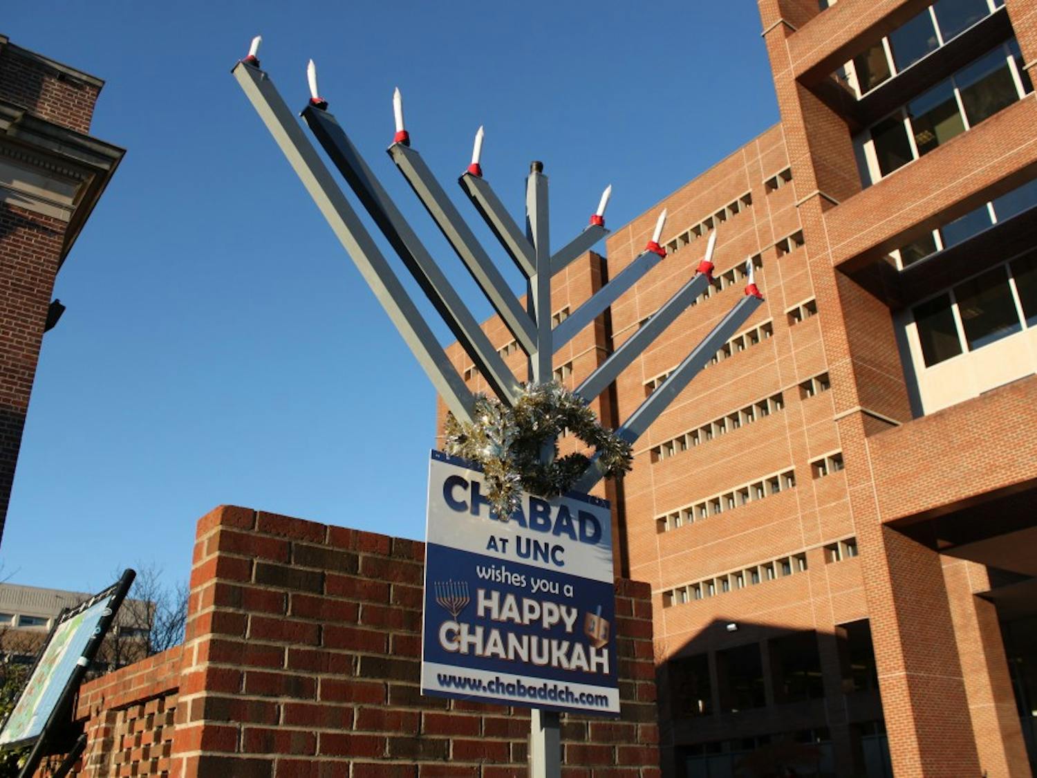 A menorah is placed outside the front of Lenoir Dining Hall by Chabad at UNC to celebrate Hanukkah, which begins on Sunday, Dec. 2, 2018 and ends Monday, Dec. 10, 2018. The menorah will be used at the menorah lighting in the Pit hosted by Chabad at UNC on Wednesday, Dec. 5, 2018.