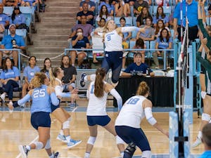 UNC sophomore outside hitter Mabrey Shaffmaster (9) hits the ball during the volleyball match against Michigan State on Friday, Sept. 9, 2022, at Carmichael Arena.  UNC beat Michigan State 3-0.