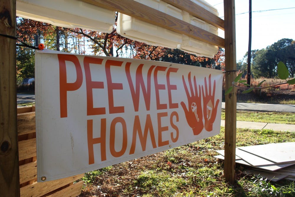 The sign for PeeWee Homes, a collection of tiny homes being developed for low income residents of Chapel Hill at The Episcopal Church of the Advocate on Wednesday, Oct. 24, 2018.