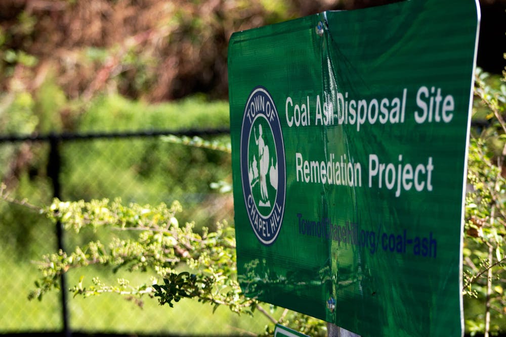 Signs near Bolin Creek Trail warn passerbys of coal ash infesting the soil along the path on Thursday, September 1, 2022.