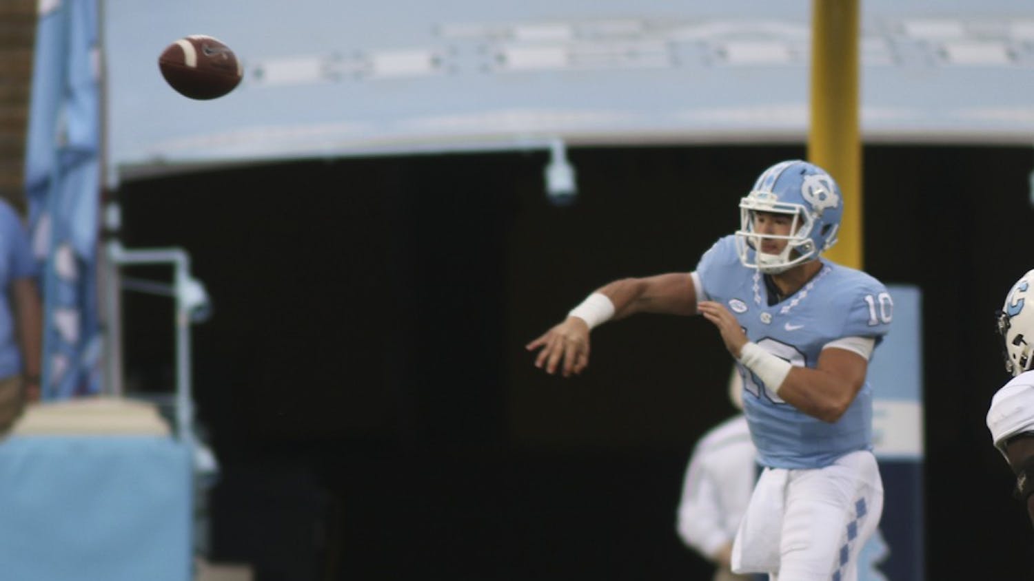 UNC quarter Mitch Trubisky (10) throws a pass on the run.