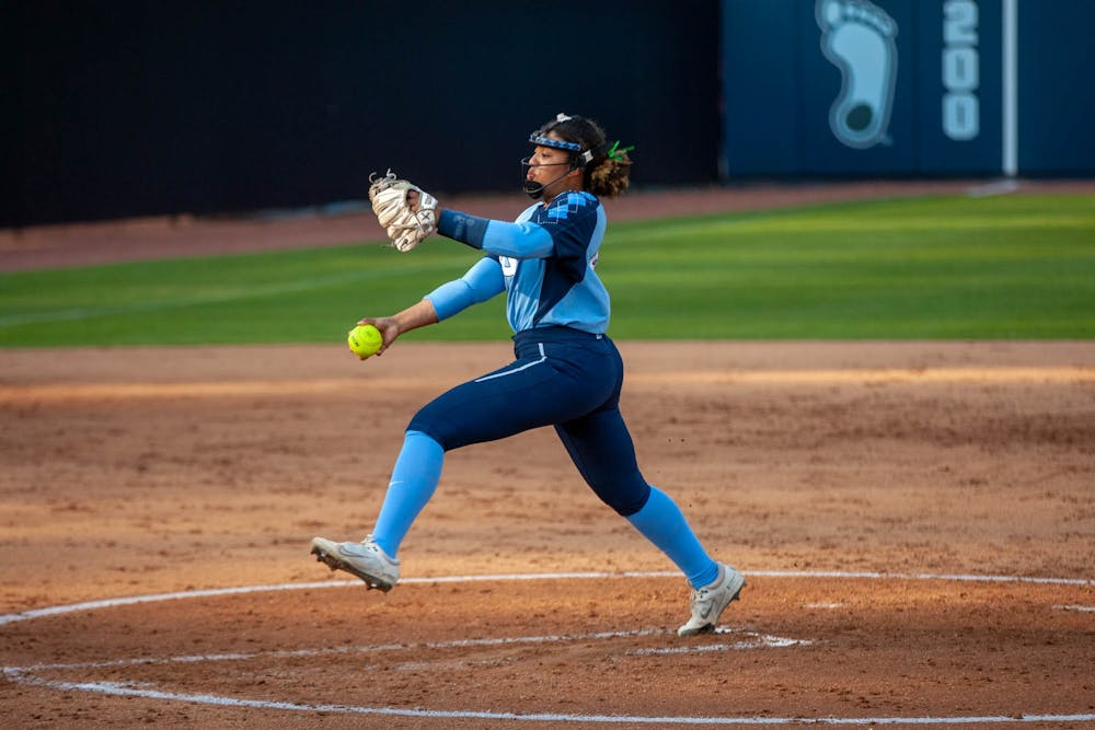 Senior pitcher, Hannah George (42) throws a pitch in Anderson Softball Stadium on Mar. 30, 2022. The Tar Heels beat the Appalacian State Mountineers 8-4 on Wednesday evening.
