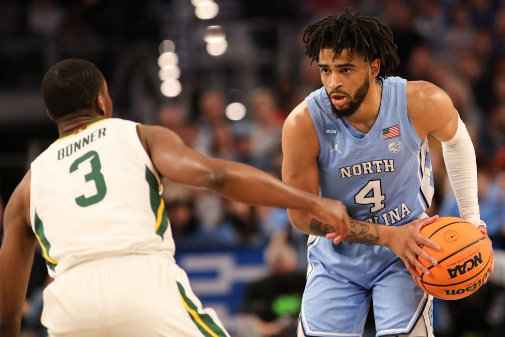 UNC sophomore guard RJ Davis (4) opens a possession during the second round of the NCAA tournament against Baylor on Saturday, March 19, 2022, in Fort Worth, Texas.