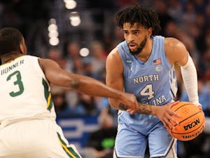 UNC sophomore guard RJ Davis (4) opens a possession during the second round of the NCAA tournament against Baylor on Saturday, March 19, 2022, in Fort Worth, Texas.