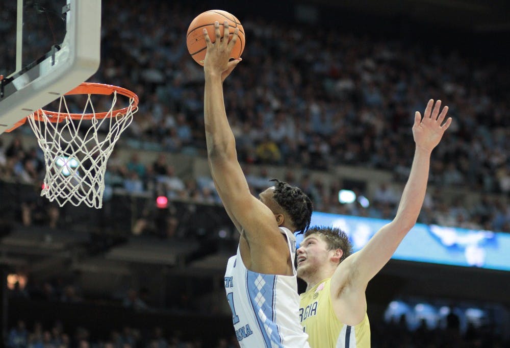 <p>Forward Sterling Manley (21) converts one of his three first-half dunks against Georgia Tech on Jan. 20 in the Smith Center.</p>