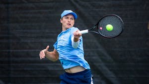 Senior Brian Cernoch hits the ball during the UNC's match against Louisville at the Chapel Hill Tennis Club on March 25th, 2022. UNC won 4-1.