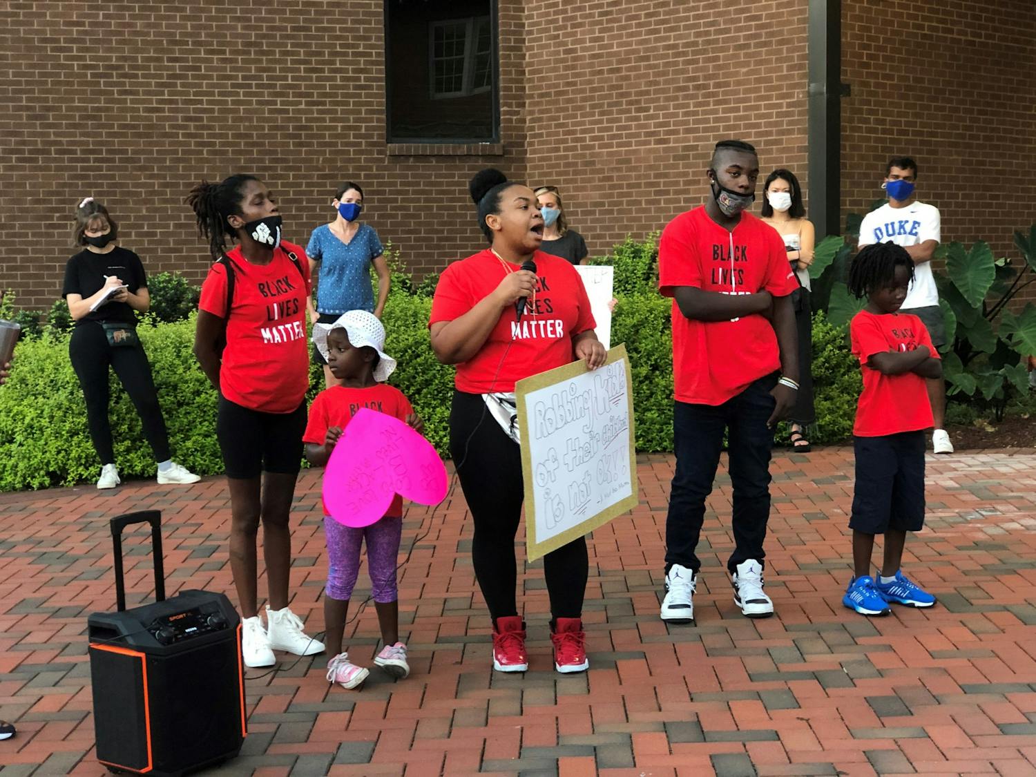  Ashley Harris speaks at a #RochelleBoysMatter protest and march in Durham Sept. 4, 2020. The protest was held after police allegedly drew their weapons on three boys playing in an east Durham apartment complex.

