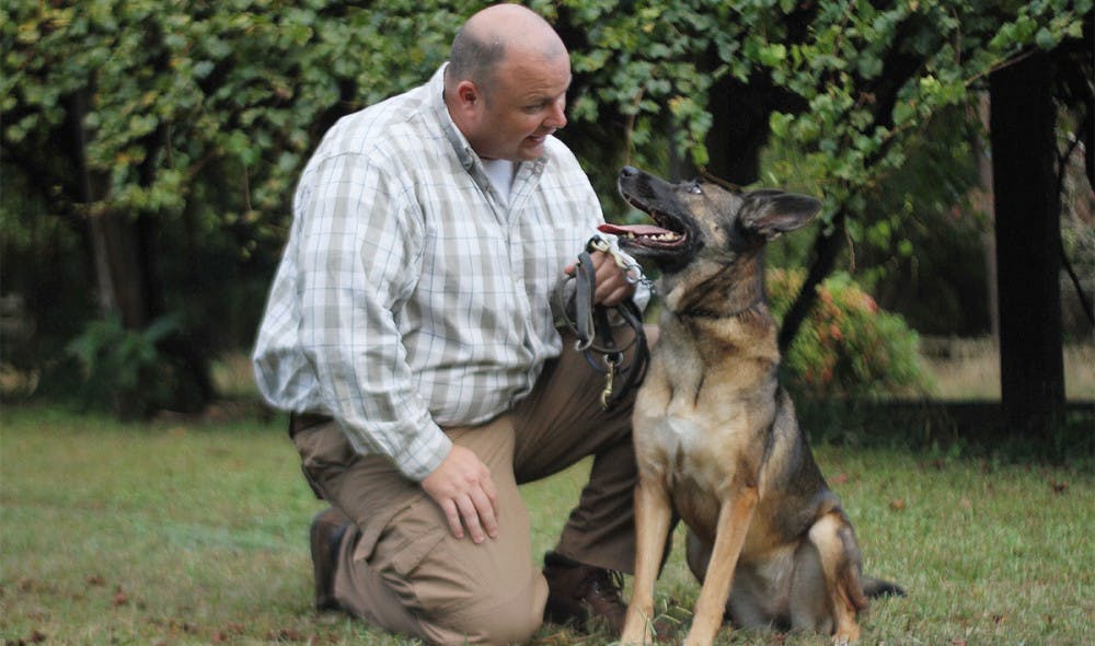 	Former Carrboro police officer Paul Reinas and his dog, Allie, have been a team for the last five years. Allie retired when Reinas switched departments.