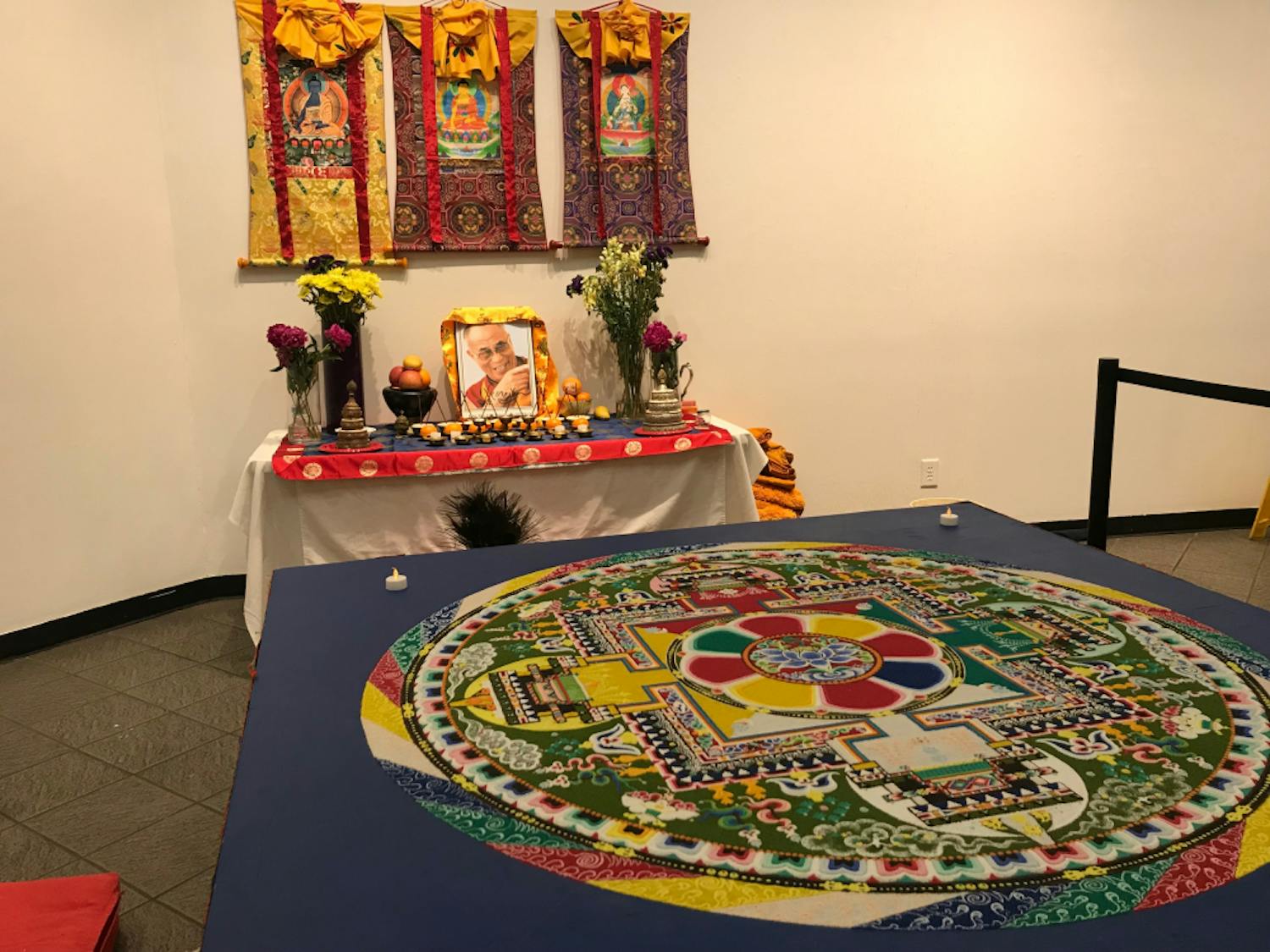 A sand mandala was constructed by Tibetan monks across five days starting May 15 as part of the Sacred Arts tour.