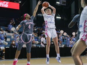 Sophomore guard Alyssa Ustby (1) pulls up at the elbow at the game against Miami on Feb. 6, 2022 in Carmichael Arena. The Heels won 85-38.