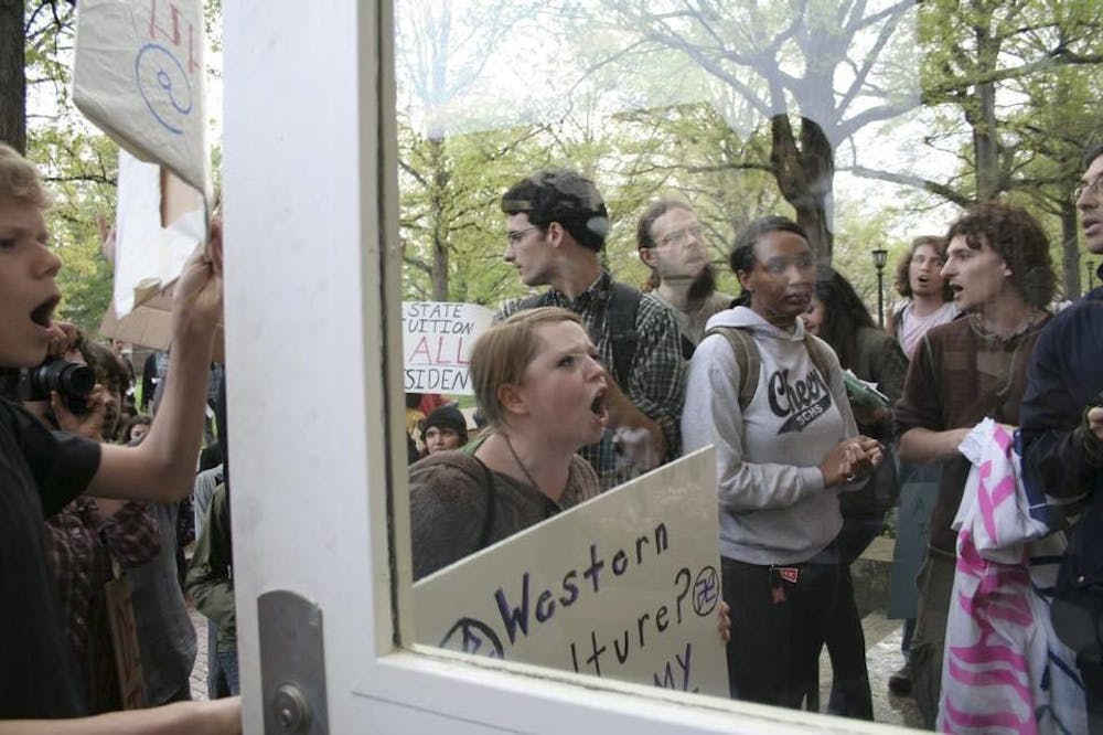 Protesters halted a speech by former U.S. Rep. Tom Tancredo at UNC in 2009. File Photo&nbsp;by Ariana van den Akker.