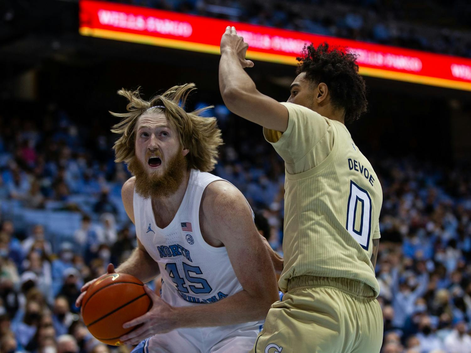 Graduate Brady Manek (45) defends the ball in the game against Georgia Tech in the Dean E. Smith Center on Saturday, Jan 15, 2022.