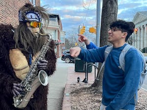 Saxsquatch performs for students walking on Franklin Street on Wednesday, Jan. 18, 2023. 
Photo Courtesy of Phoebe Martel.