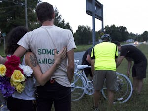 A year ago on Friday, two cyclists were struck and killed on 15-501. In memorial, their friends painted two bicycles and rode out to the site to decorate them. Jason Merrill, from Back Alley Bikes, painted the two bicycles and helped to organize the ride. He explained that "anytime cyclists are struck, it definitely hits close to home."