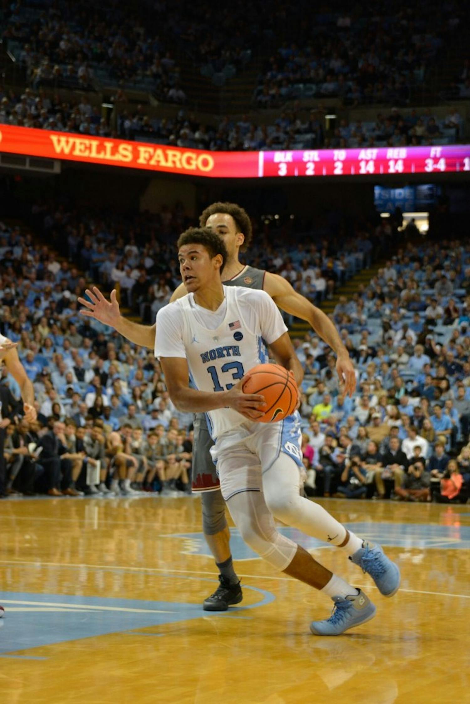 North Carolina guard Cameron Johnson (13) drives towards the basket during Tuesday night's game against Boston College.&nbsp;