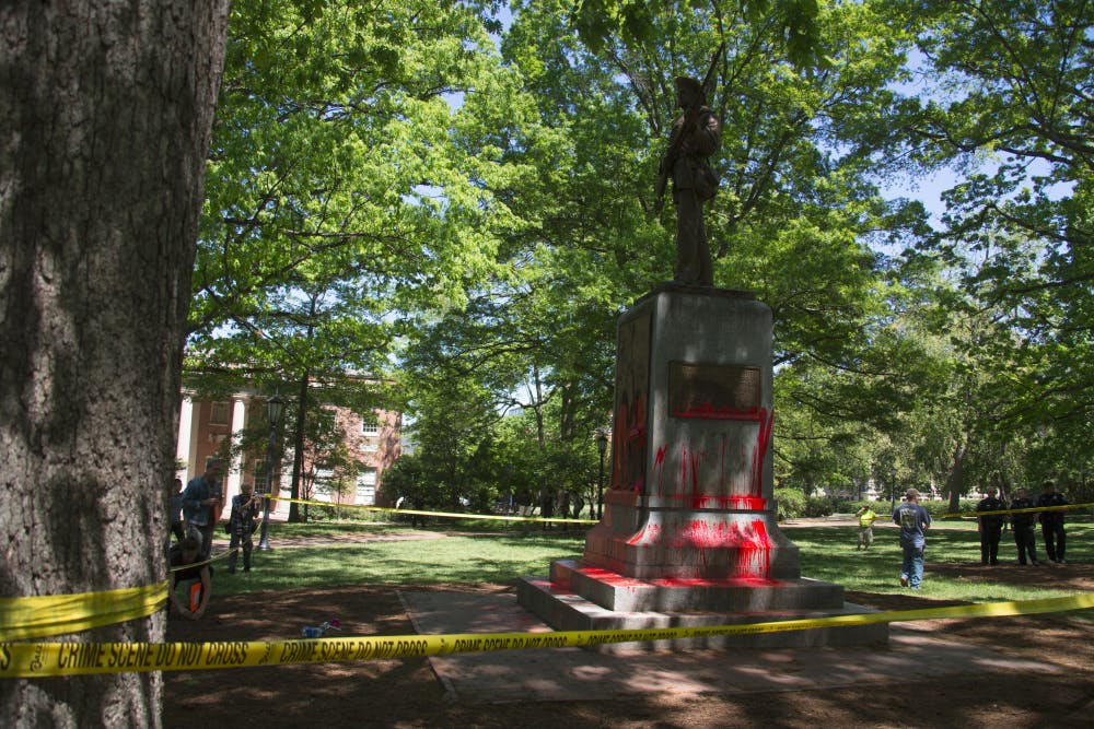 Silent Sam, a Confederate monument on campus, was defaced with red paint on Monday, Apr. 30, 2018.