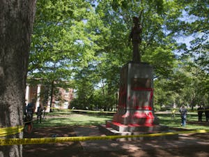 Silent Sam, a Confederate monument on campus, was defaced with red paint on Monday, Apr. 30, 2018.
