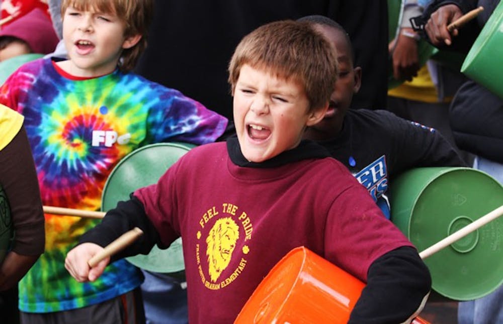 Students at Frank Porter Graham Elementary help lead the parade during the Walk For Education on Saturday.DTH/Margaret Williams