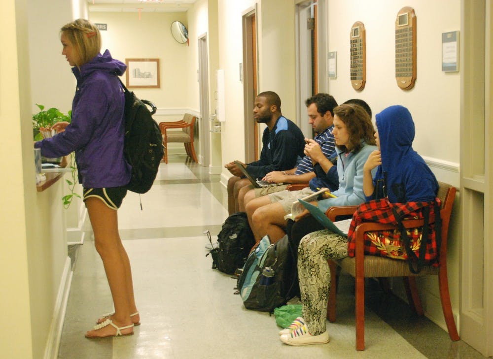 Students wait in Steele Building to drop classes or switch to pass/fail.