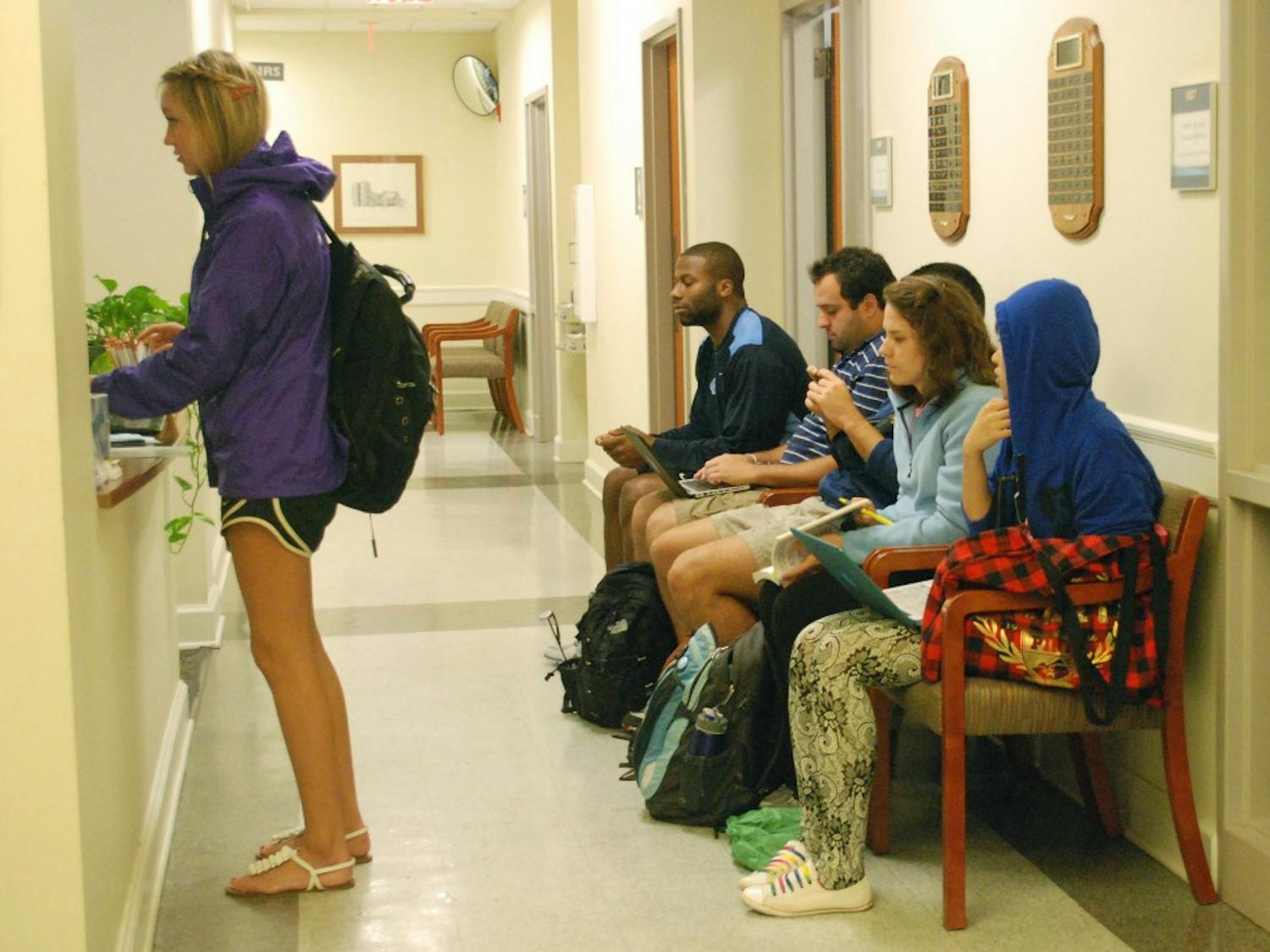 Students wait in Steele Building to drop classes or switch to pass/fail.
