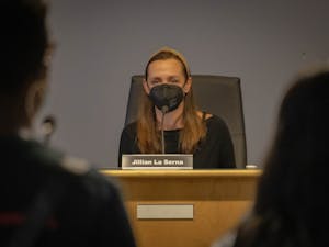 Jillian La Serna, chairperson of the Chapel Hill-Carrboro City Schools Board of Education, yields public comments at the board's Aug. 12, 2021 meeting.