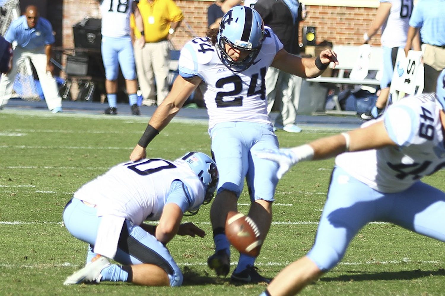 North Carolina kicker Nick Weiler (24) makes a field goal attempt. He is fighting for a starting spot.