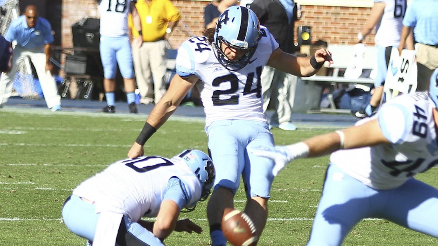 North Carolina kicker Nick Weiler (24) makes a field goal attempt. He is fighting for a starting spot.