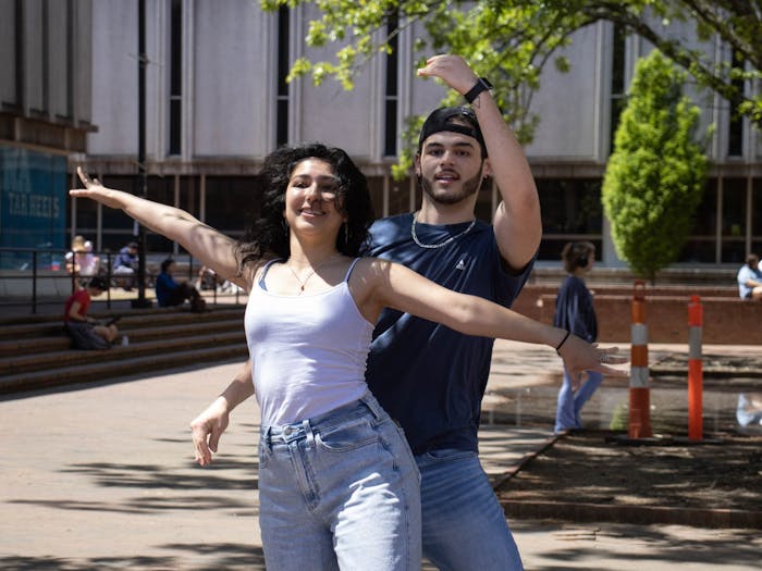 UNC sophomore English major Luisa Peñaflor and senior pre-med student Michael Kane perform in The Pit as a part of the UNC Latin dance group Qué Rico on Monday, April 17, 2023. Qué Rico will have a show on April 23 at 7 p.m. in the Great Hall of Frank Porter Graham Student Union, and it will be the first large-scale Latin dance show at UNC.