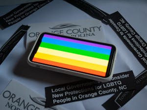 DTH Photo Illustration. Local governments met to discuss protections for LGBTQ+ people in Orange County.