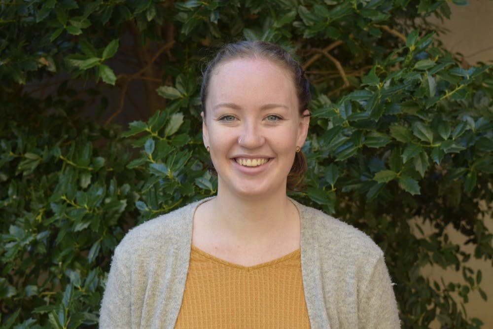 Emma Hayes, senior psychology major, is a transfer student who has struggled with class registration and fulfilling general education requirements due to UNC's stringent credit transfer policies. 