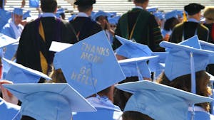 Graduates decorated their caps for the ceremony, many giving shootouts to their moms on Mother's Day. 
