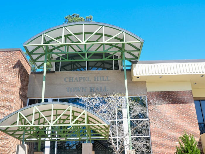 Chapel Hill Town Hall stands on Sunday, March 19, 2023. From now until April 1, Chapel Hill residents, UNC students, and those who live in surrounding areas can apply to be a member of the Town’s advisory boards.