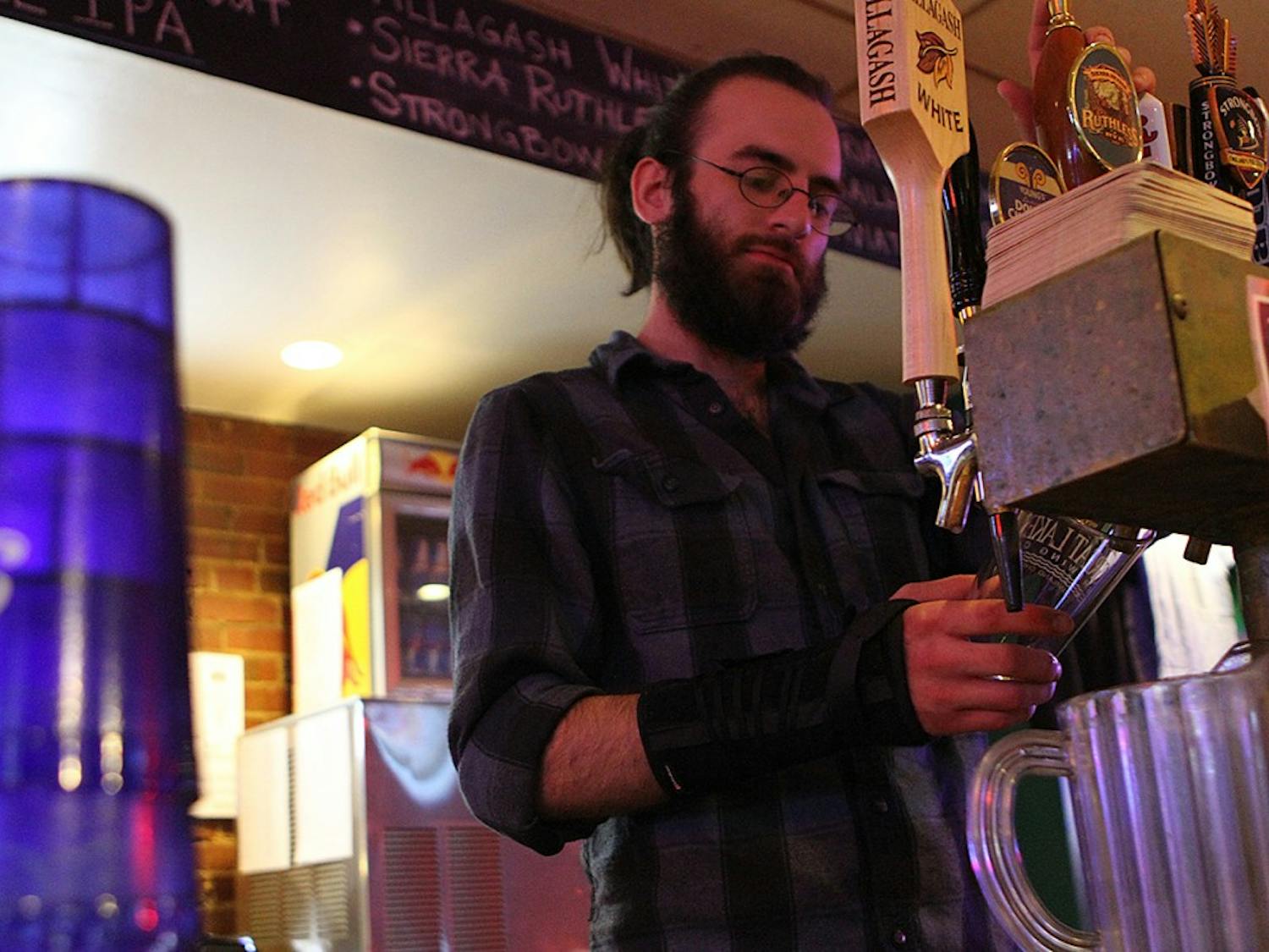 	Adam Kiihr works at Linda&#8217;s Bar and Grill on Wednesday night.