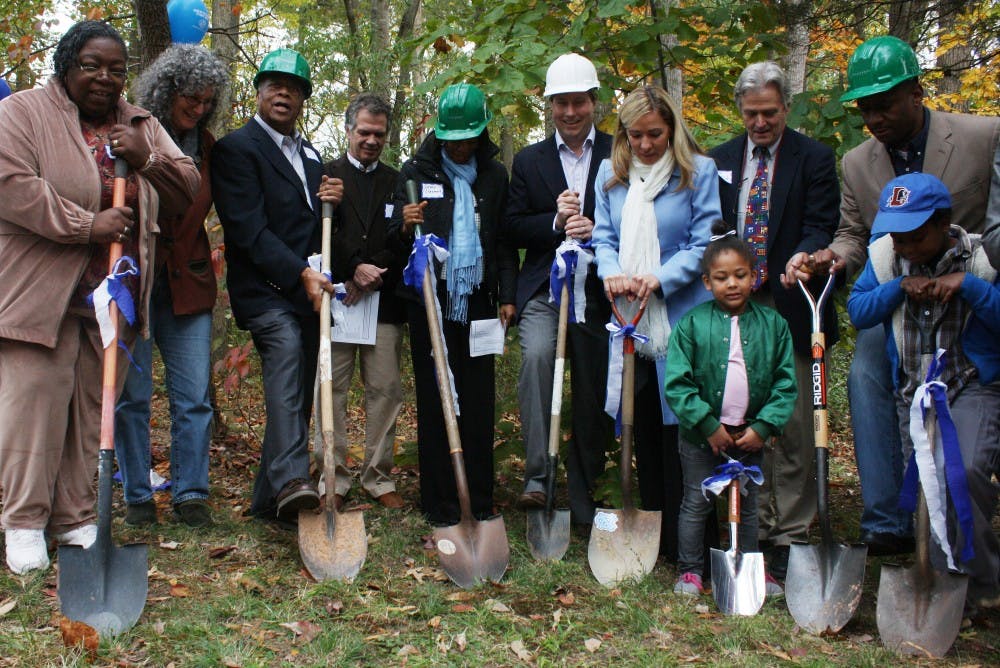 The community comes together to celebrate the ground breaking of the Boys & Girls Club at the Pine Knolls Center on Johnson Street.