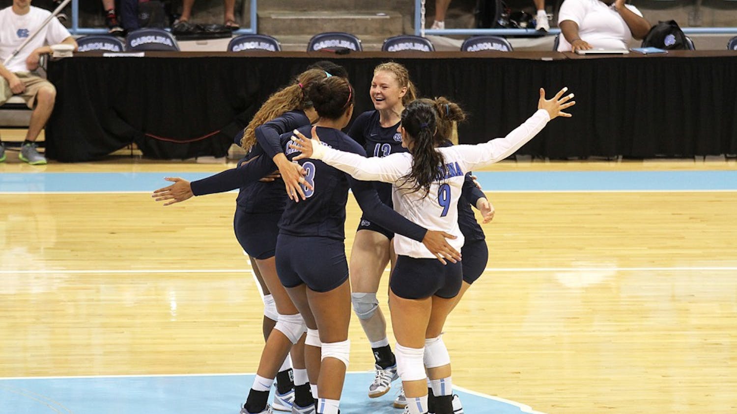 UNC's volleyball team embrace between plays during their match again Georgia Southern Saturday.  They would go on to win 3-0.
