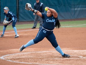 UNC first-year pitcher Alyssa Stanley (7) pitches the ball during the game against James Madison at G. Anderson Softball Stadium on Wednesday Feb. 19, 2020. UNC lost to Madison 3-6.