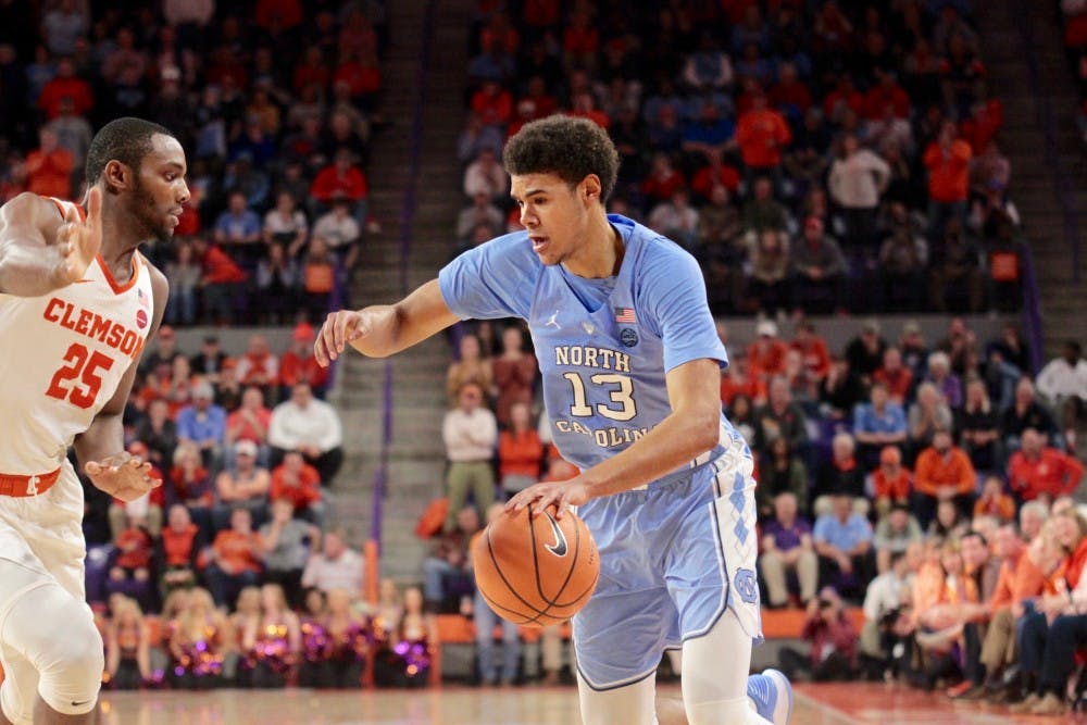 North Carolina guard Cameron Johnson (13) drives to the basket against Clemson on Jan. 30 in Littlejohn Coliseum.