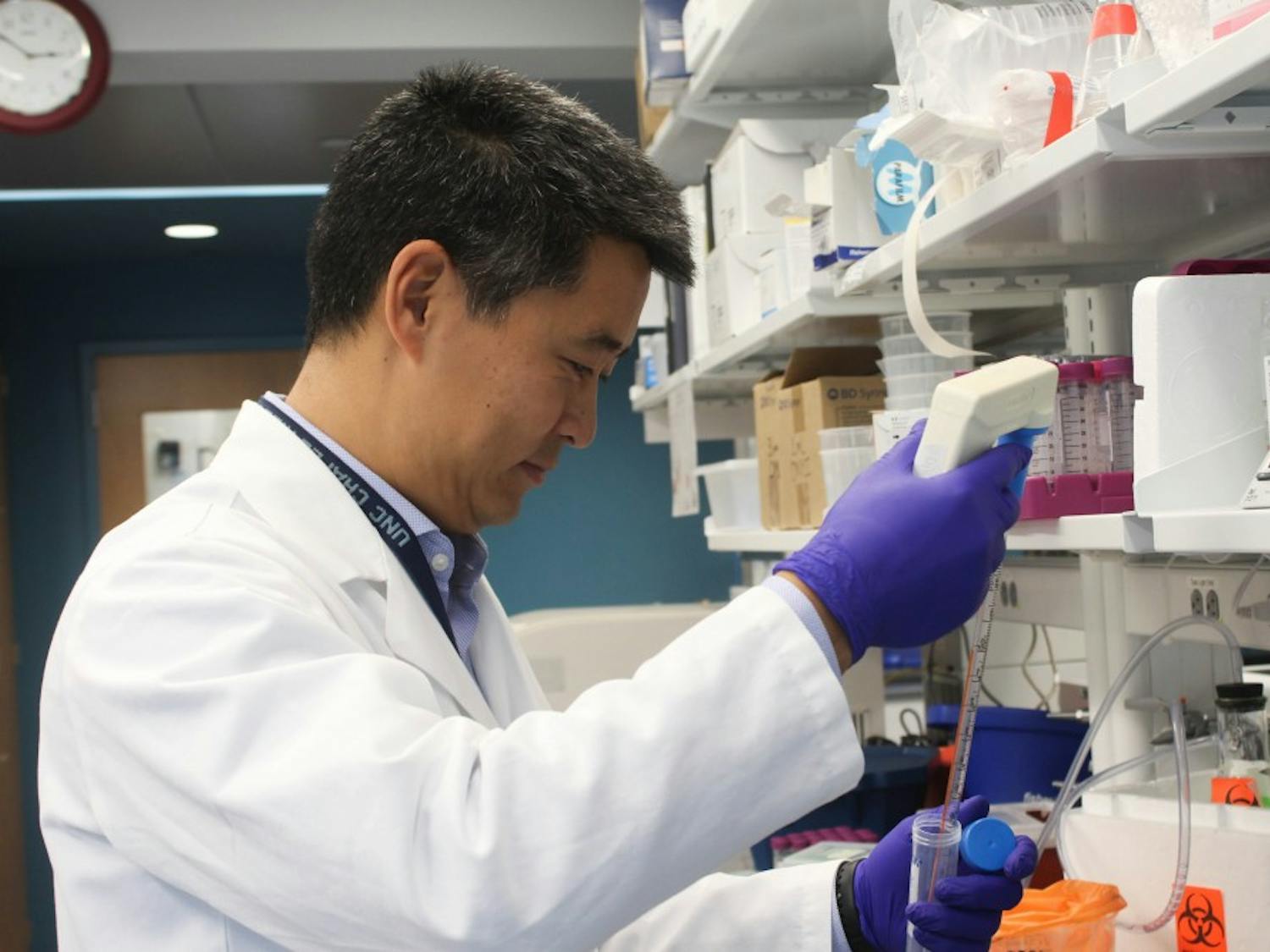Chapel Hill resident, Dr. Edwin Kim, 55, working in the lab for the UNC Food Allergy Initiative at the Mary Ellen Jones building on Friday, Oct. 4, 2019. Kim and the UNC Food Allergy Initiative are developing peanut allergy treatments to make those with allergies less reactive to allergens. Kim's daughter and son both have nut allergies.