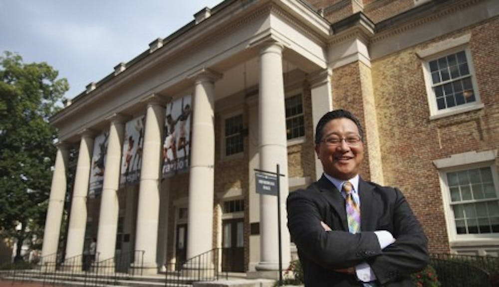 Emil Kang, Carolina’s first Executive Director of the Arts, poses in front of Memorial Hall. Kang has pioneered the univeristy’s recent artistic expansion.