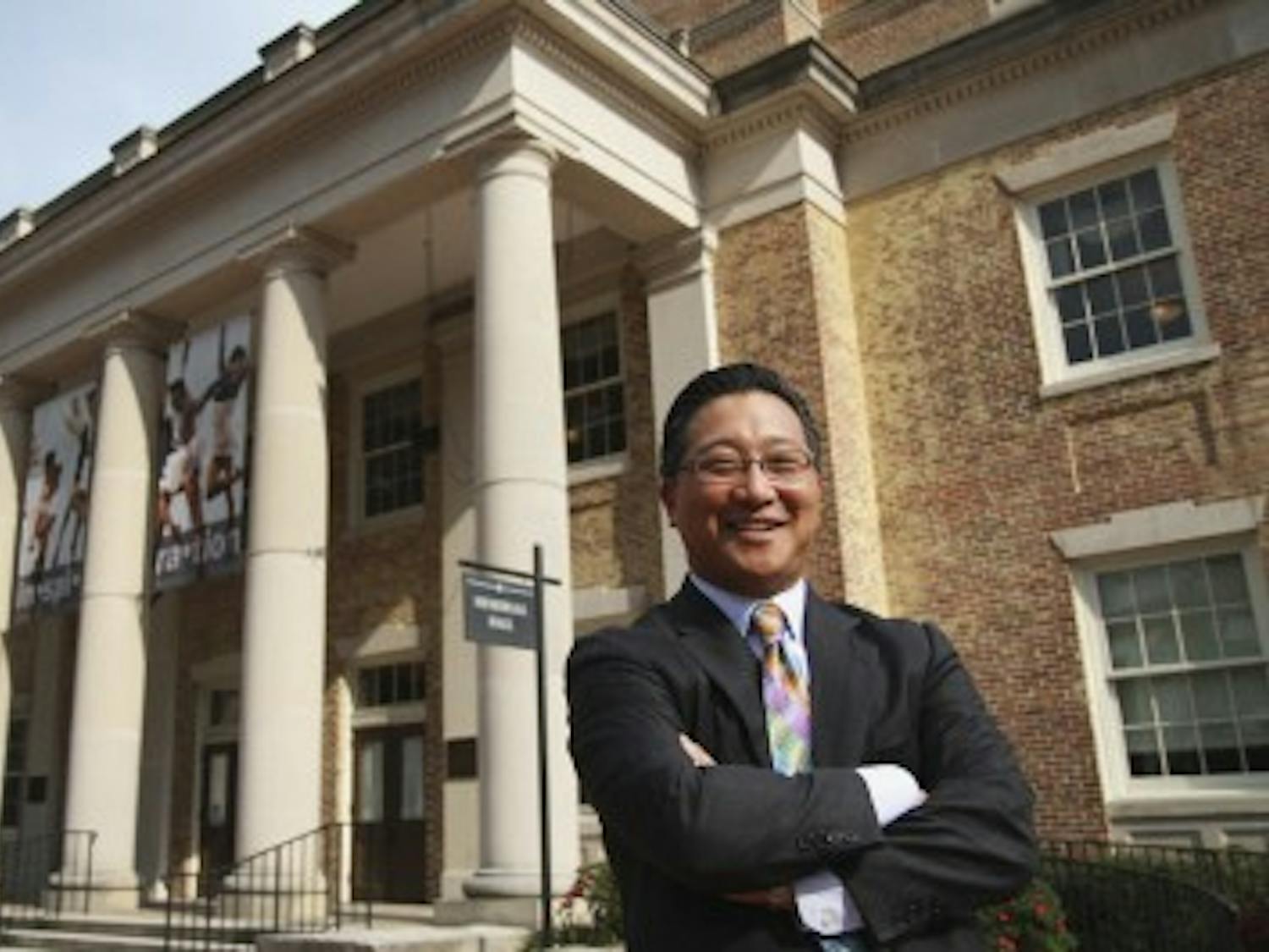 Emil Kang, Carolina’s first Executive Director of the Arts, poses in front of Memorial Hall. Kang has pioneered the univeristy’s recent artistic expansion.
