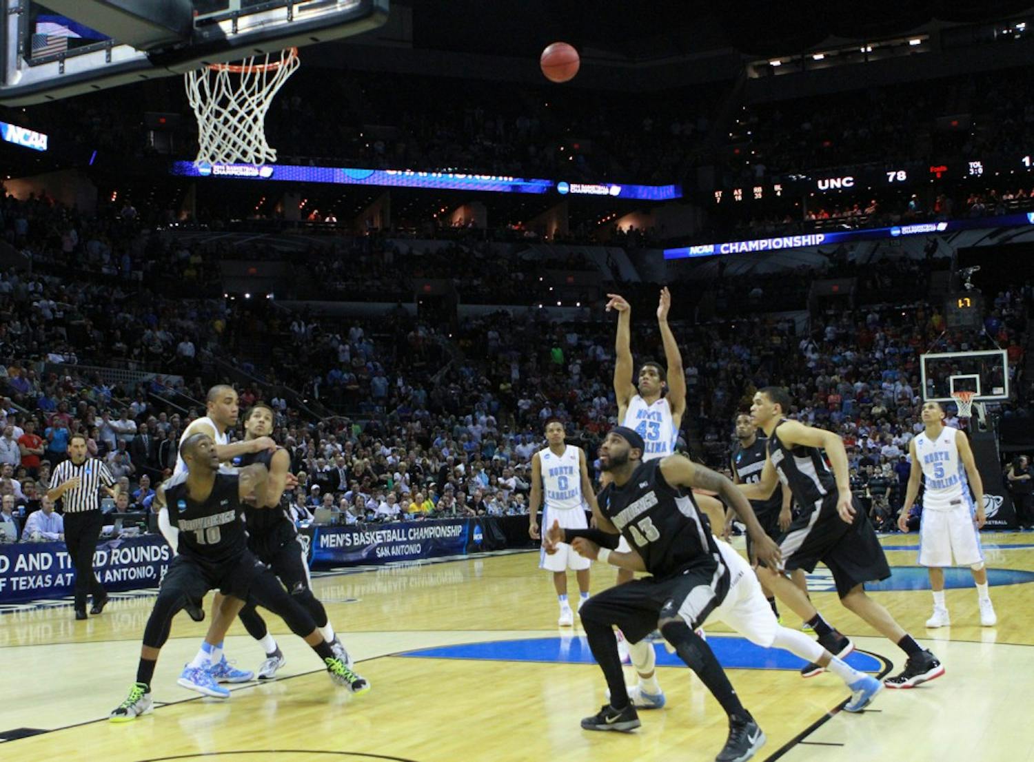 James Michael McAdoo hits a free throw to put UNC up two points to win the game. UNC defeated Providence 79-77 in the second round of the NCAA tournament at the AT&T Center in San Antonio, TX. The Tar Heels advance to play in the third round on Sunday.