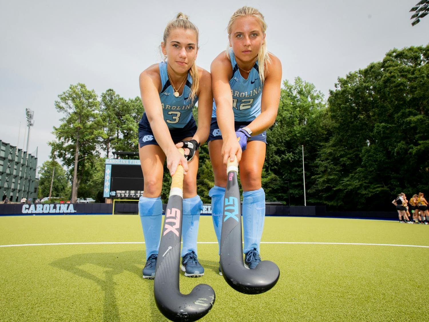 First-years Ashley Sessa (3) and Ryleigh Heck (12) are new faces at Carolina but bring a long resume of excellence to the field hockey team.