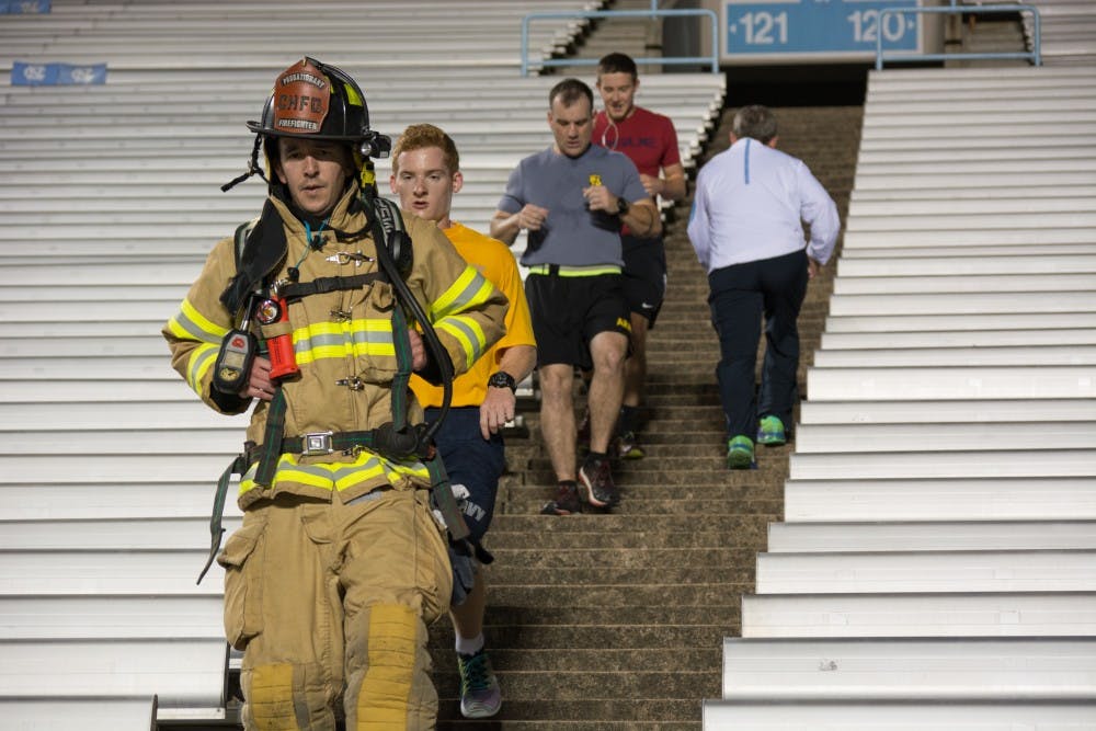 <p>Individuals in ROTC and Chancellor Folt met at Kenan Memorial Football Stadium Monday morning to participate in a stair climb to commemorate 9/11.&nbsp;</p>