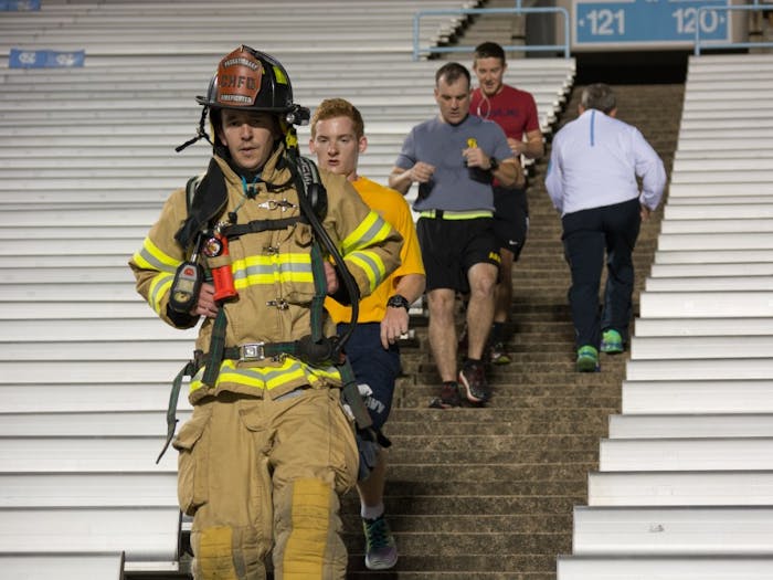 Individuals in ROTC and Chancellor Folt met at Kenan Memorial Football Stadium Monday morning to participate in a stair climb to commemorate 9/11.&nbsp;