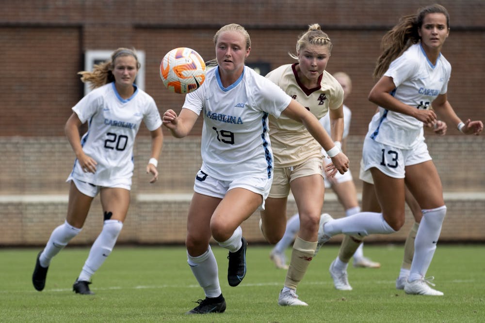 UNC players race for the ball at the UNC women’s soccer game against Boston College at Dorrance Field on Sunday, Sept. 25, 2022. UNC won 3-0.