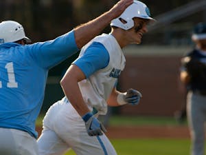 First-year Casey Cook celebrates his first home run during UNC’s 10-0 victory over Longwood on Wednesday, Feb. 22, at Boshamer Stadium.